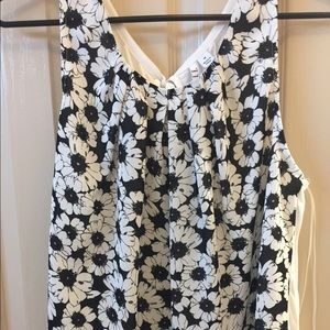 Black and white flower sleeveless blouse.